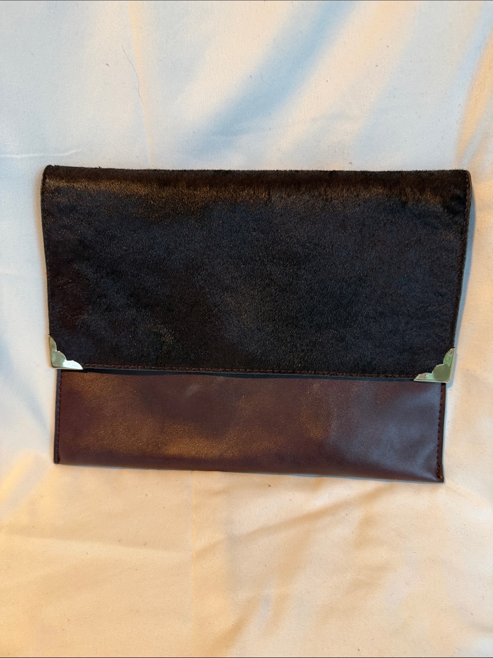 Hair on hide upper leather deep plum clutch